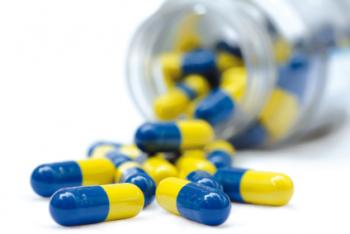 cápsulas de drogas azuis e amarelas